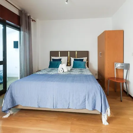 E Quartos Primorosa Apartment